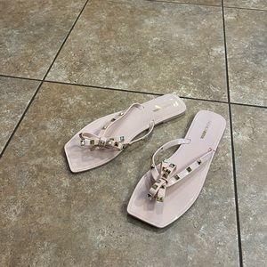 FASHION NOVA cream studded bow accent flip flops